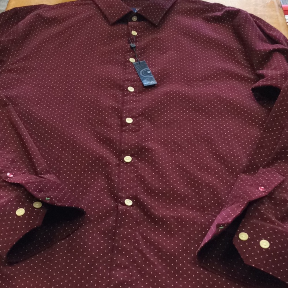 John Lennon shirt.
